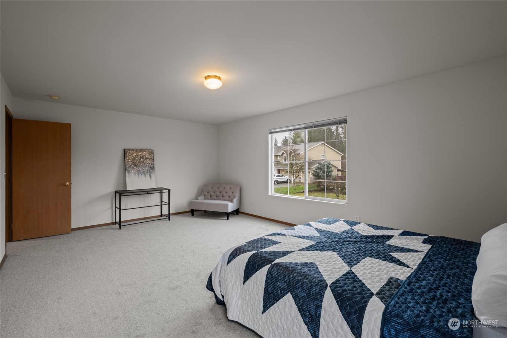 2306 Southeast 3rd Street Renton, WA 98056 - Photo 18 of 34 a bedroom with bed and a window