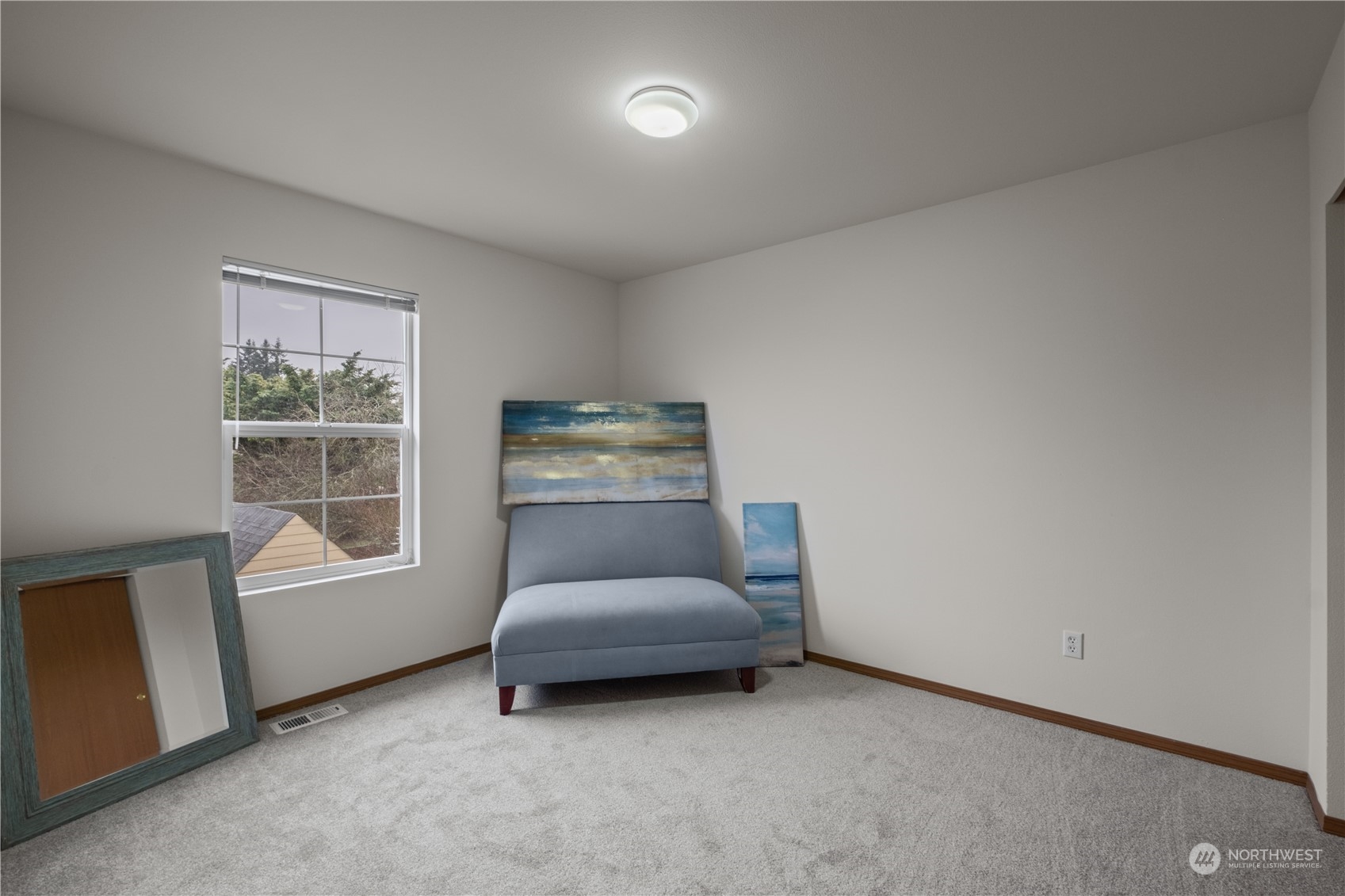 2306 Southeast 3rd Street Renton, WA 98056 - Photo 24 of 34 a living room with furniture and a window