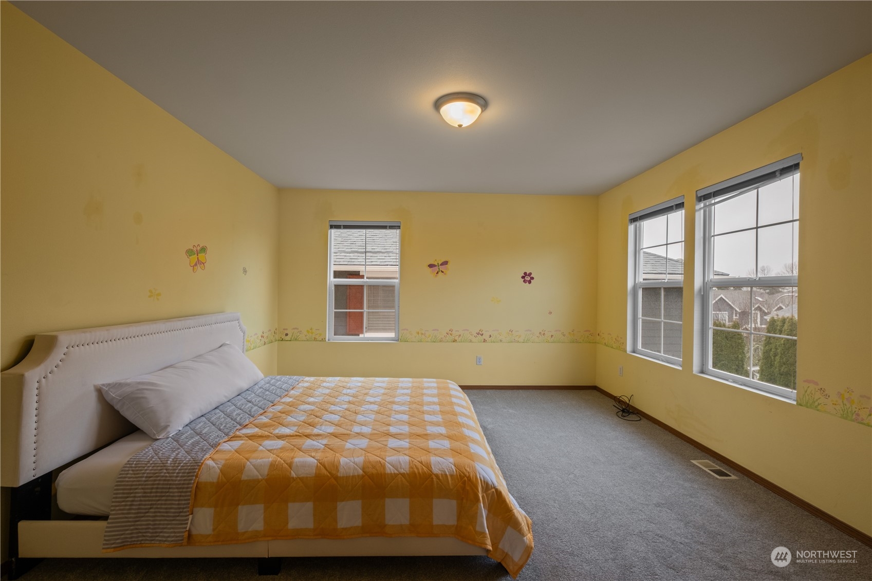 2306 Southeast 3rd Street Renton, WA 98056 - Photo 26 of 34 a bedroom with a bed and wooden floor
