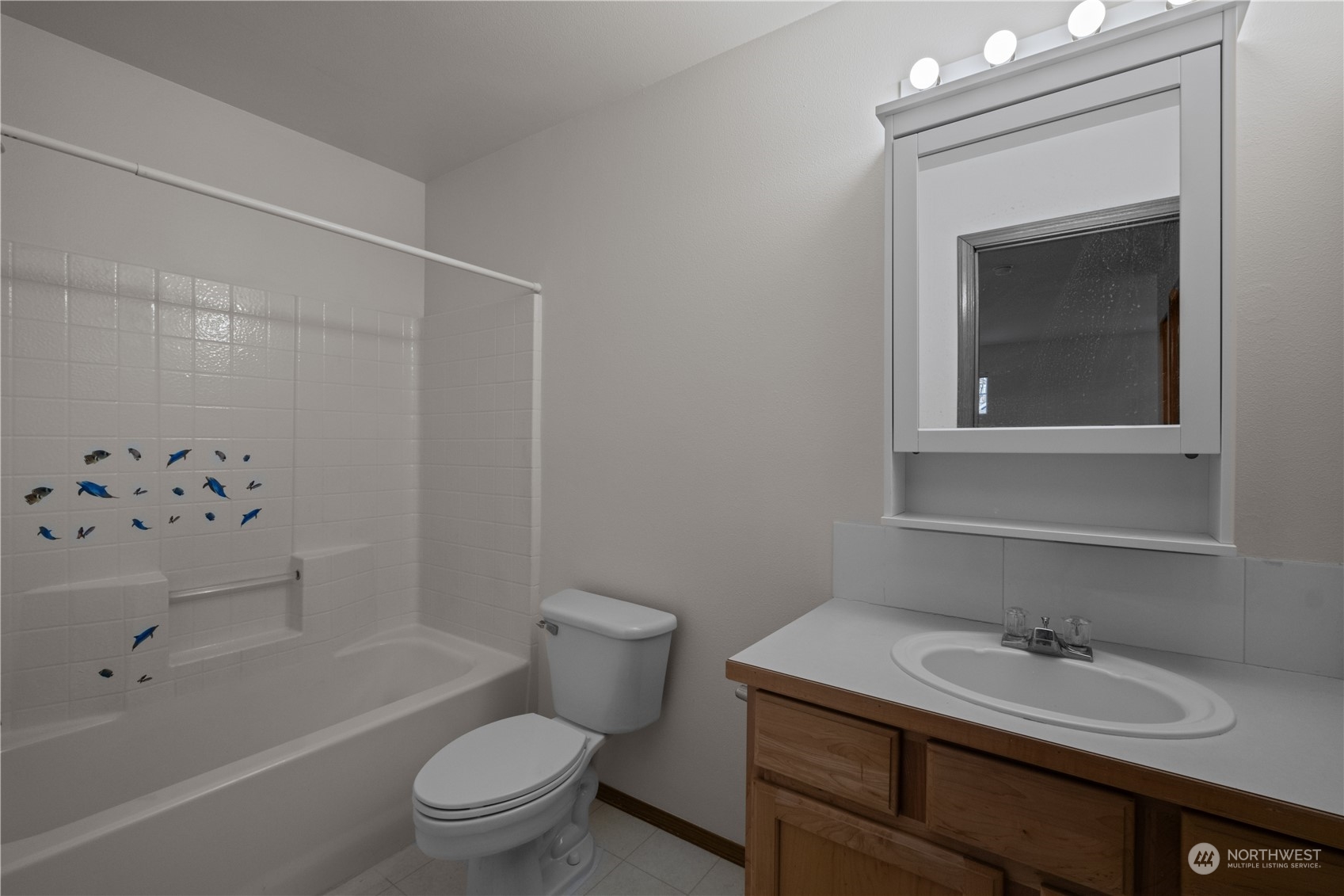 2306 Southeast 3rd Street Renton, WA 98056 - Photo 28 of 34 a bathroom with a sink a toilet and shower