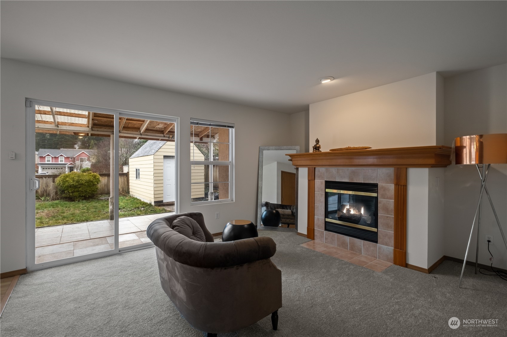 2306 Southeast 3rd Street Renton, WA 98056 - Photo 7 of 34 a living room with furniture and a fireplace
