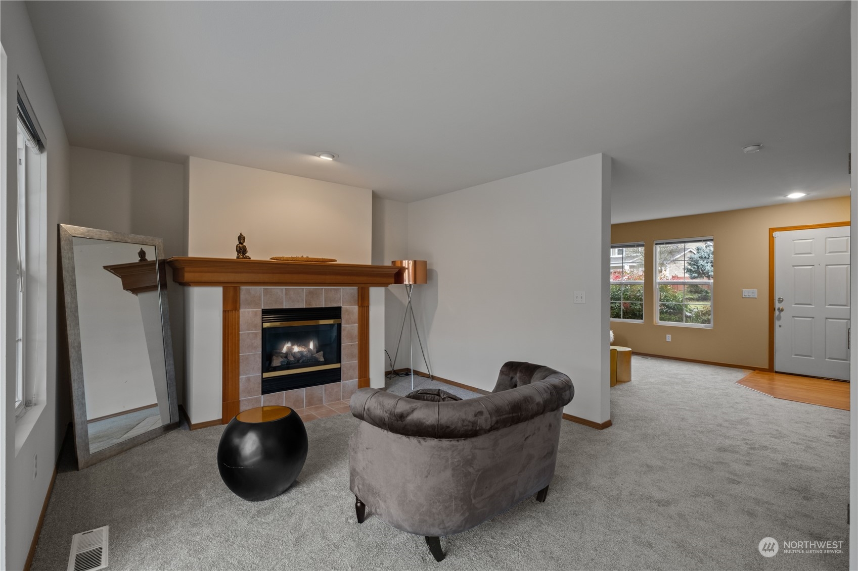 2306 Southeast 3rd Street Renton, WA 98056 - Photo 8 of 34 a living room with furniture and a fireplace
