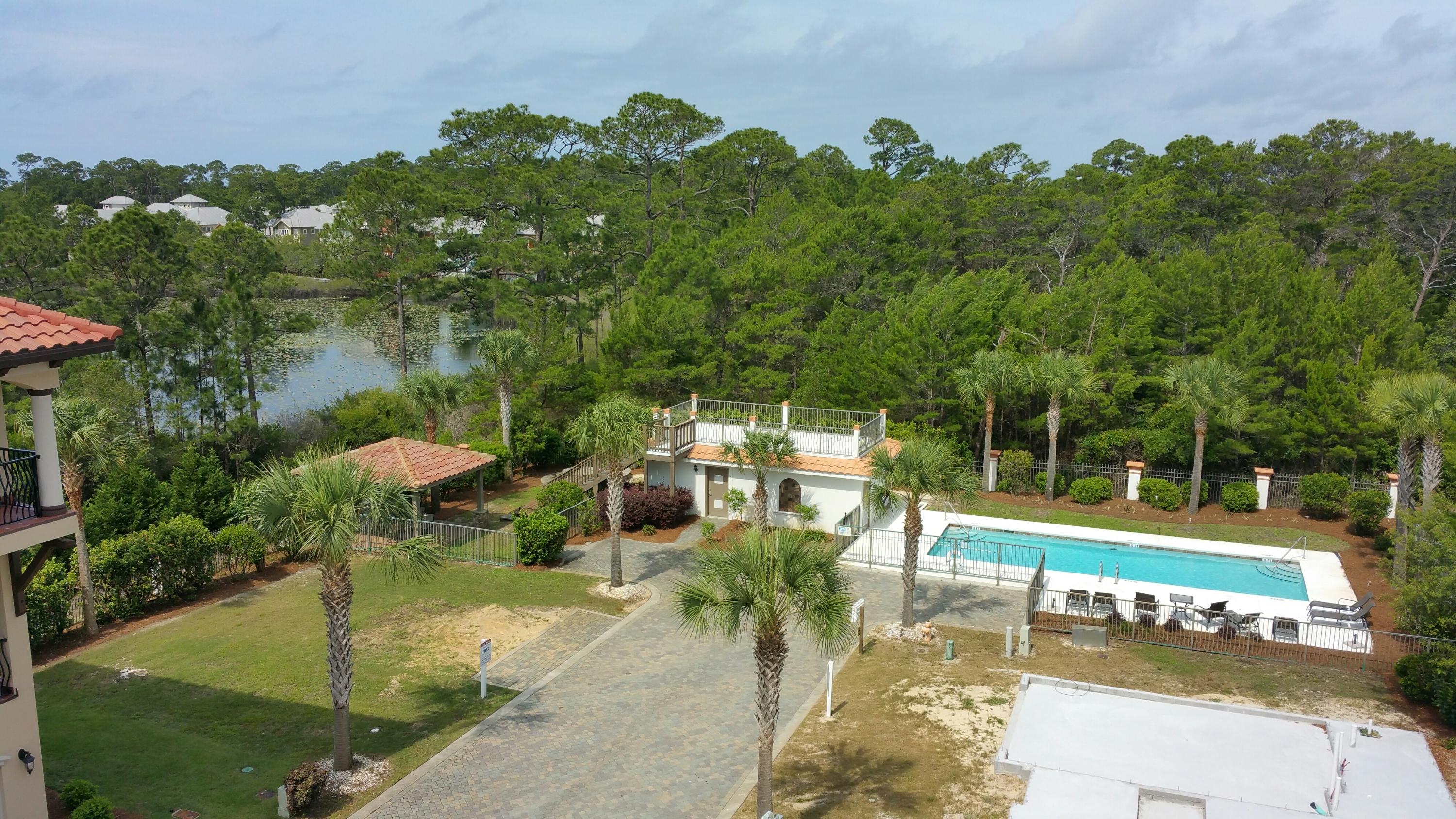 Lot 4 Starview Santa Rosa Beach Santa Rosa Beach, FL 32459 - Photo 3 of 5 a view of a swimming pool with a patio