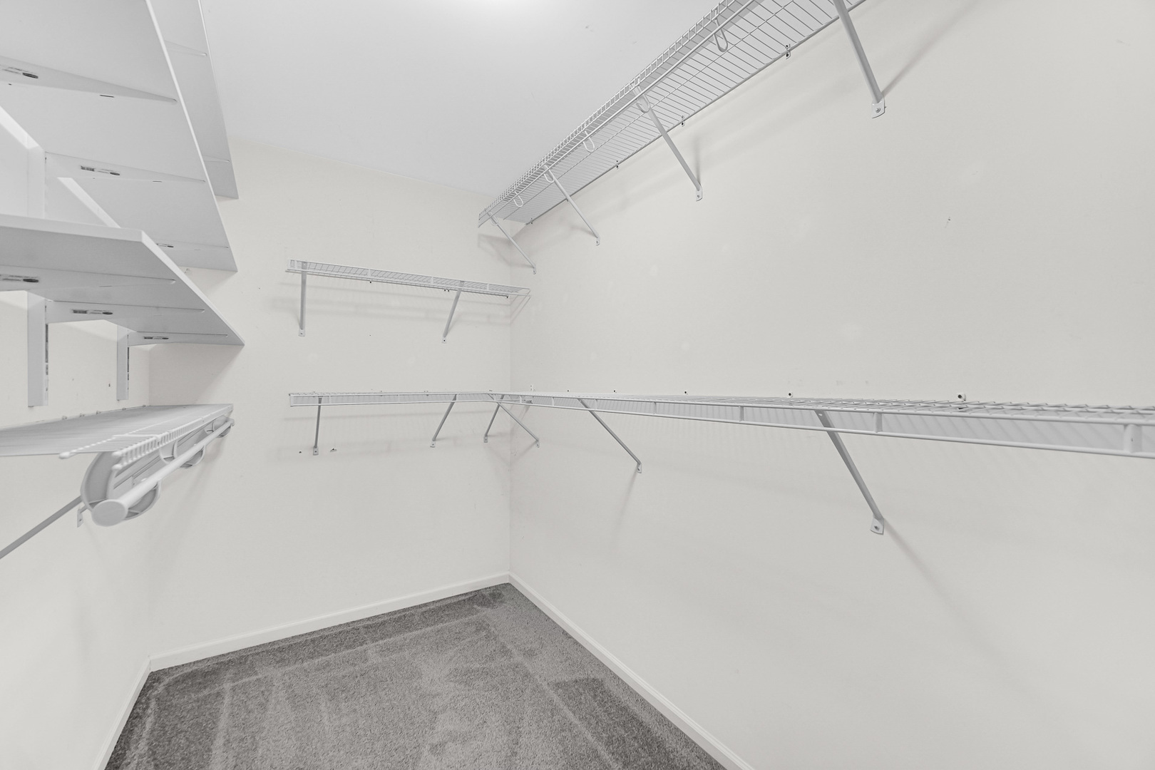 2331 Georgetown Circle Aurora, IL 60503 - Photo 14 of 20 a view of storage and utility room with racks on the wall