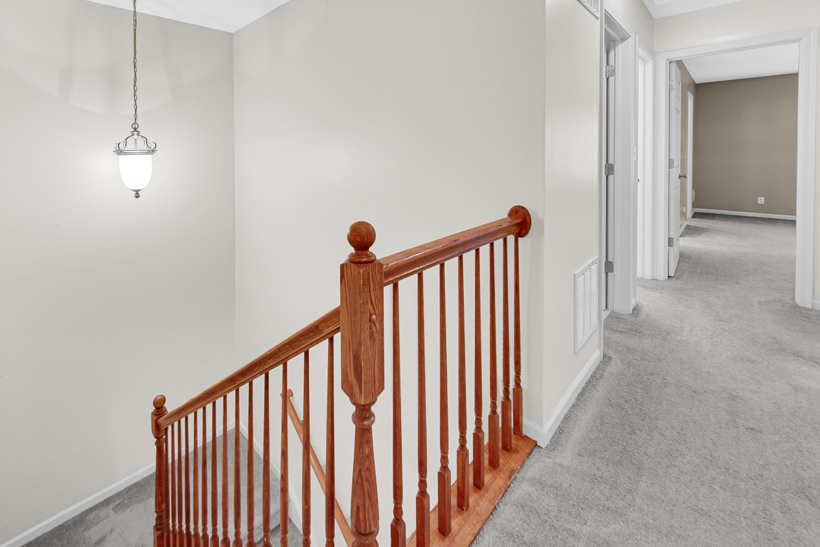 2331 Georgetown Circle Aurora, IL 60503 - Photo 18 of 20 a view of a hallway with stairs