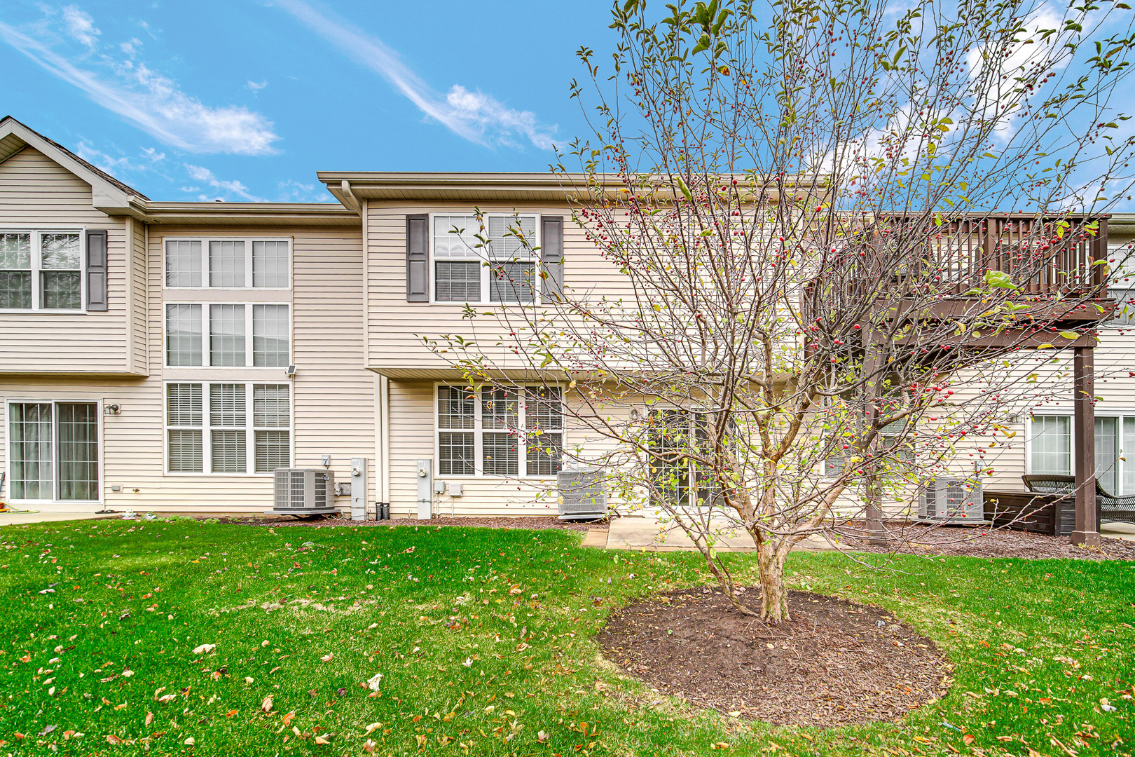 2331 Georgetown Circle Aurora, IL 60503 - Photo 20 of 20 a view of a house with a yard