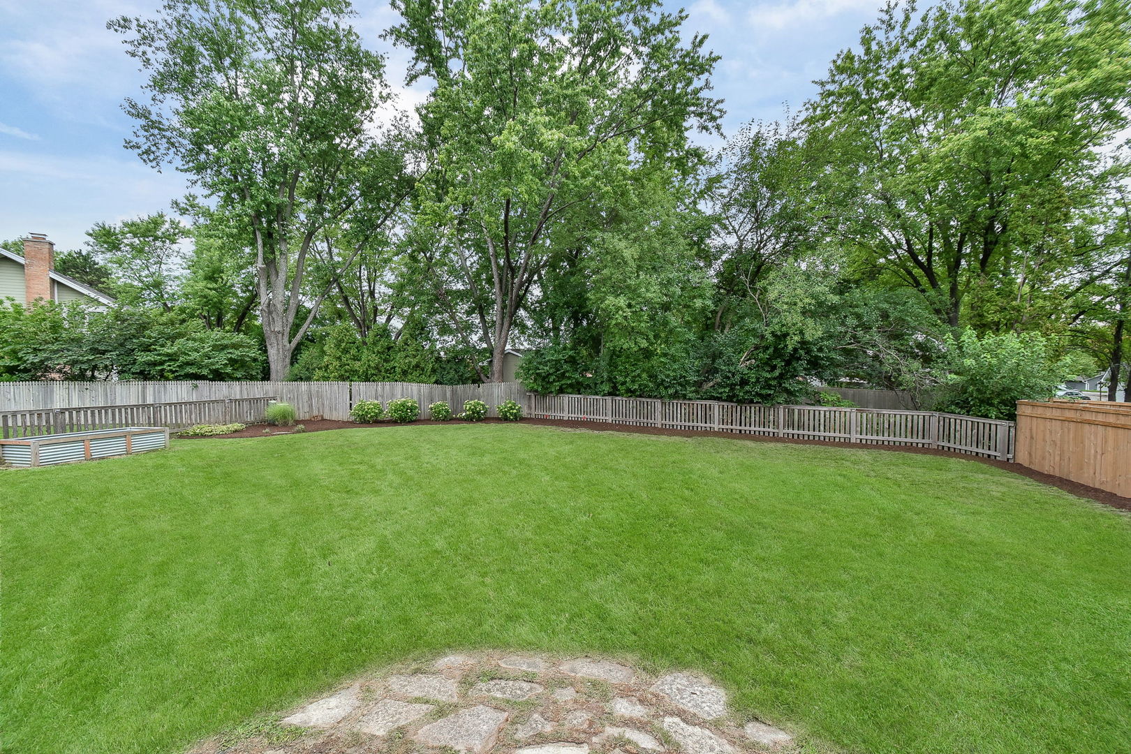 65 Redstart Road Naperville, IL 60565 - Photo 10 of 48 a view of a yard