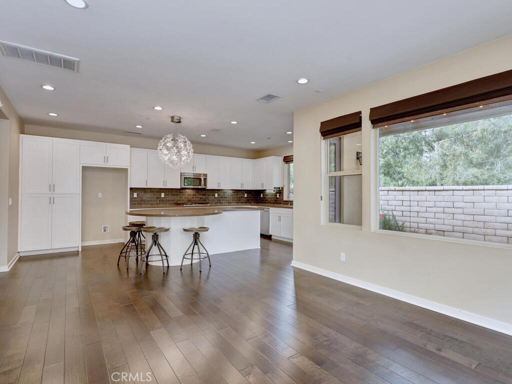 37 Clover Lake Forest, CA 92630 - Photo 12 of 75 a kitchen with a table and chairs