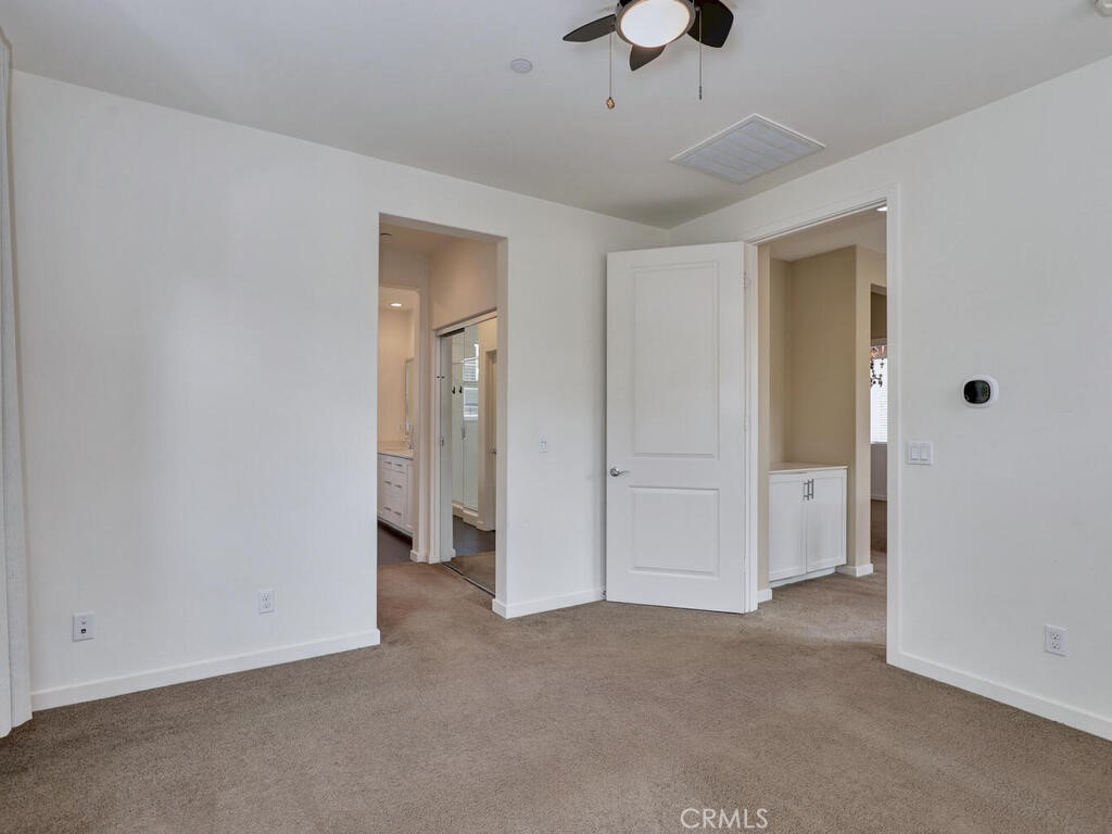 37 Clover Lake Forest, CA 92630 - Photo 17 of 75 a view of an empty room and a ceiling fan