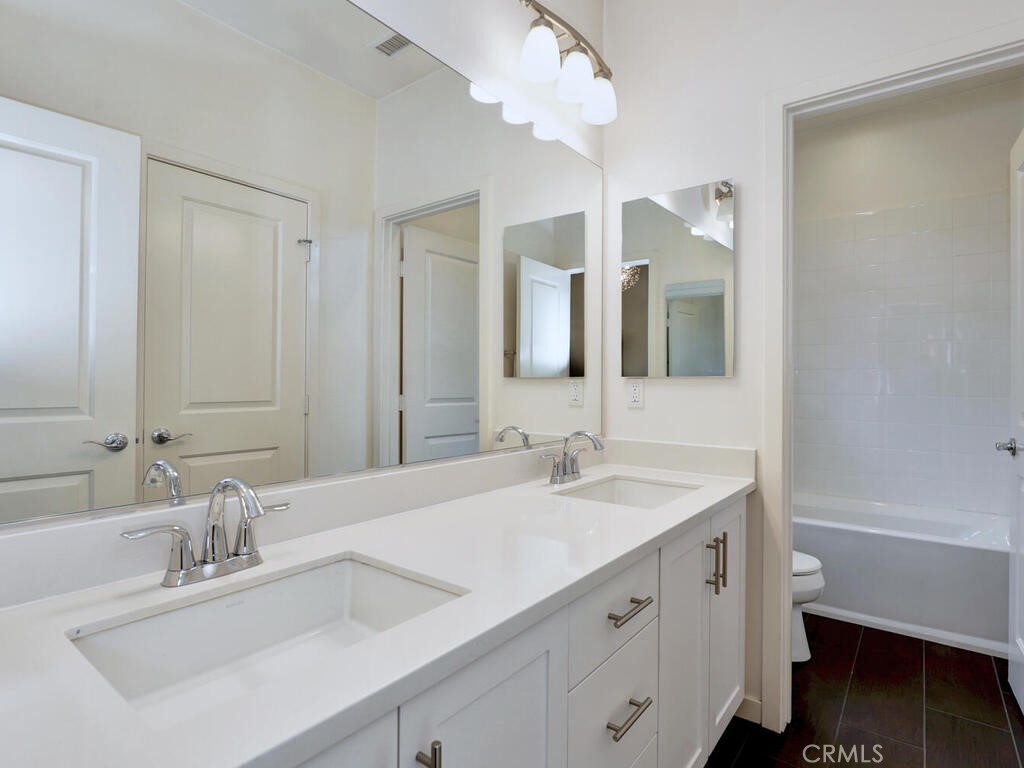 37 Clover Lake Forest, CA 92630 - Photo 25 of 75 a bathroom with a double vanity sink mirror and double