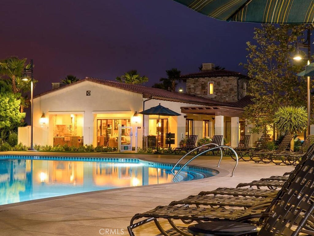 37 Clover Lake Forest, CA 92630 - Photo 39 of 75 a view of a swimming pool with an outdoor space and seating area