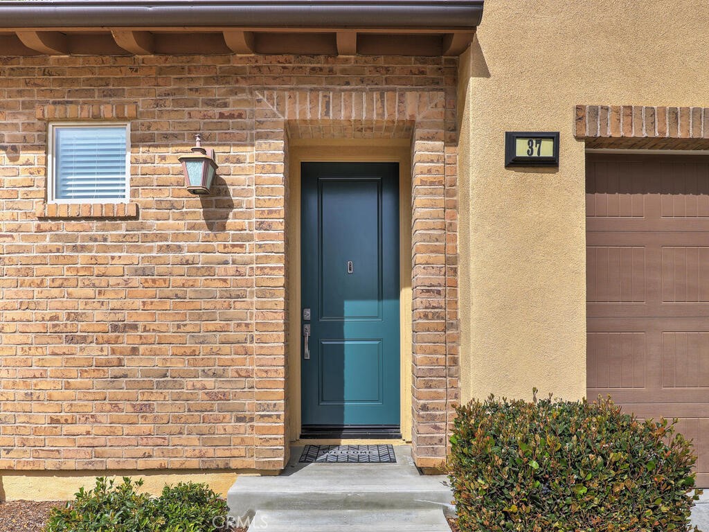 37 Clover Lake Forest, CA 92630 - Photo 4 of 75 a front view of a house with a yard