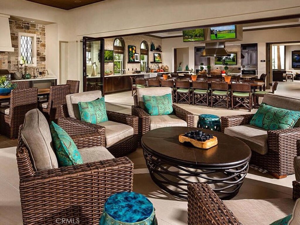 37 Clover Lake Forest, CA 92630 - Photo 47 of 75 a living room with furniture and a large window