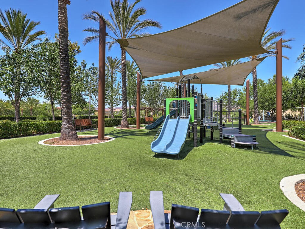 37 Clover Lake Forest, CA 92630 - Photo 59 of 75 a view of a swimming pool with a table and chairs