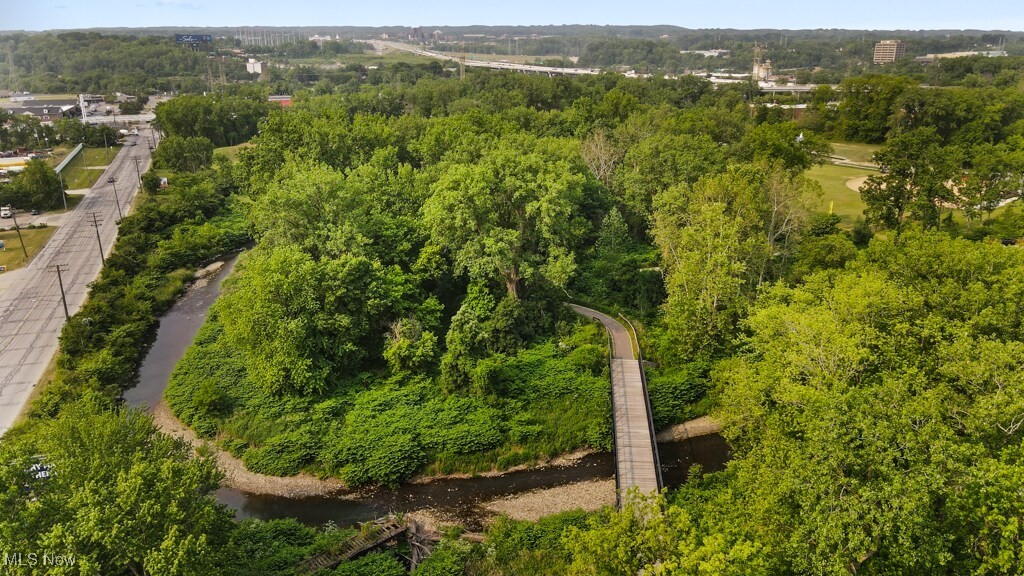 5000 Warner Road Garfield Heights, OH 44125 - Photo 36 of 41 Drone / aerial view of a tree filled landscape