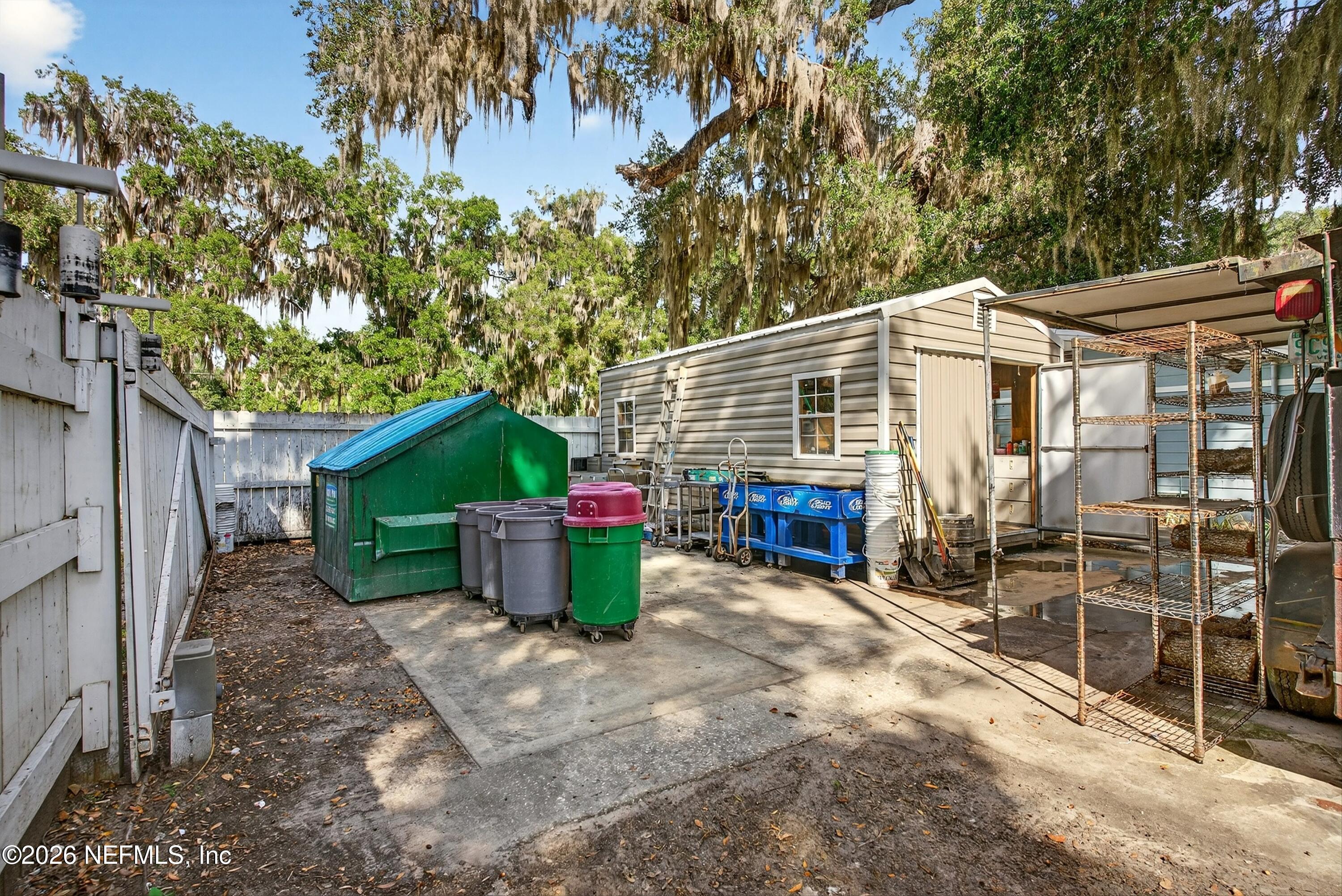 201 Oak Street Welaka, FL 32193 - Photo 106 of 115 a view of a house with a yard and sitting area