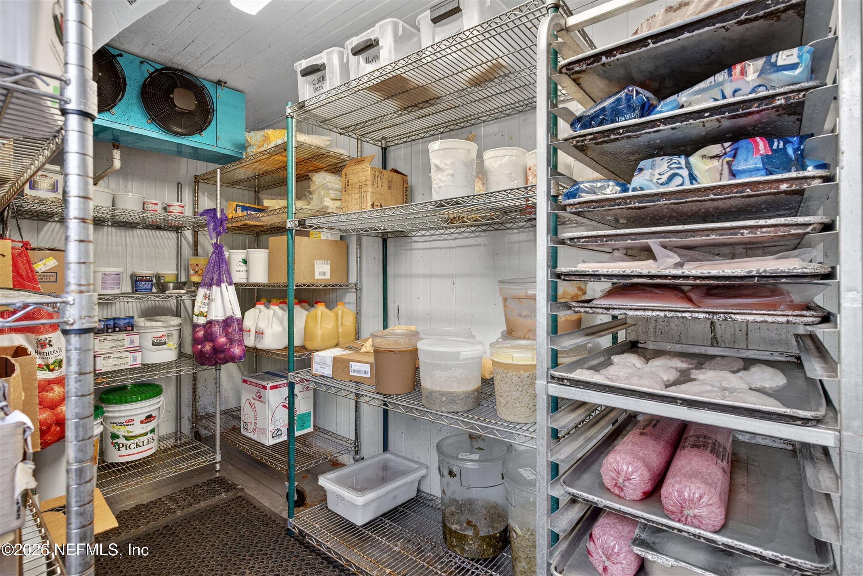 201 Oak Street Welaka, FL 32193 - Photo 114 of 115 a store room with stainless steel appliances and a wooden floor