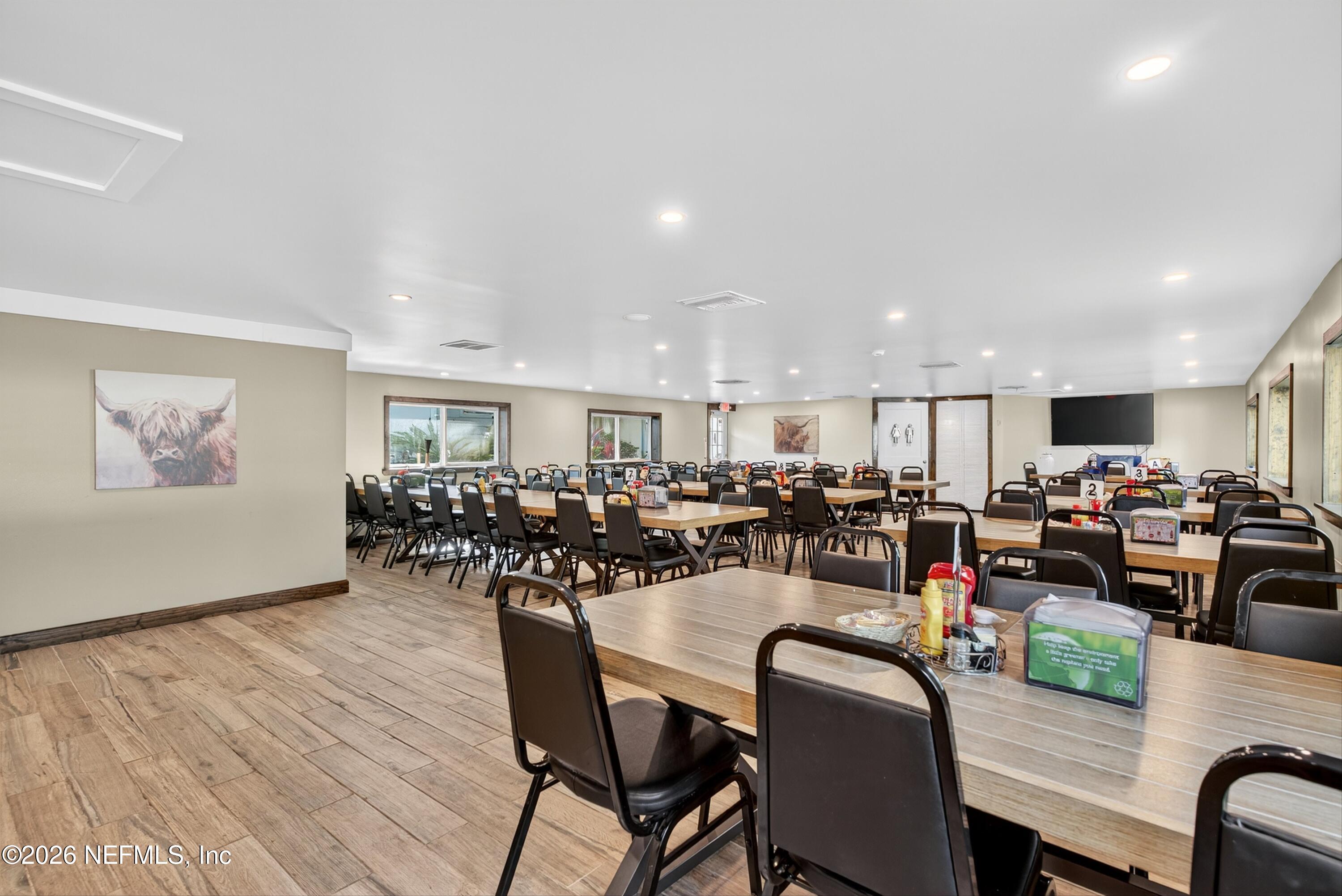 201 Oak Street Welaka, FL 32193 - Photo 43 of 115 a view of a dining room with furniture