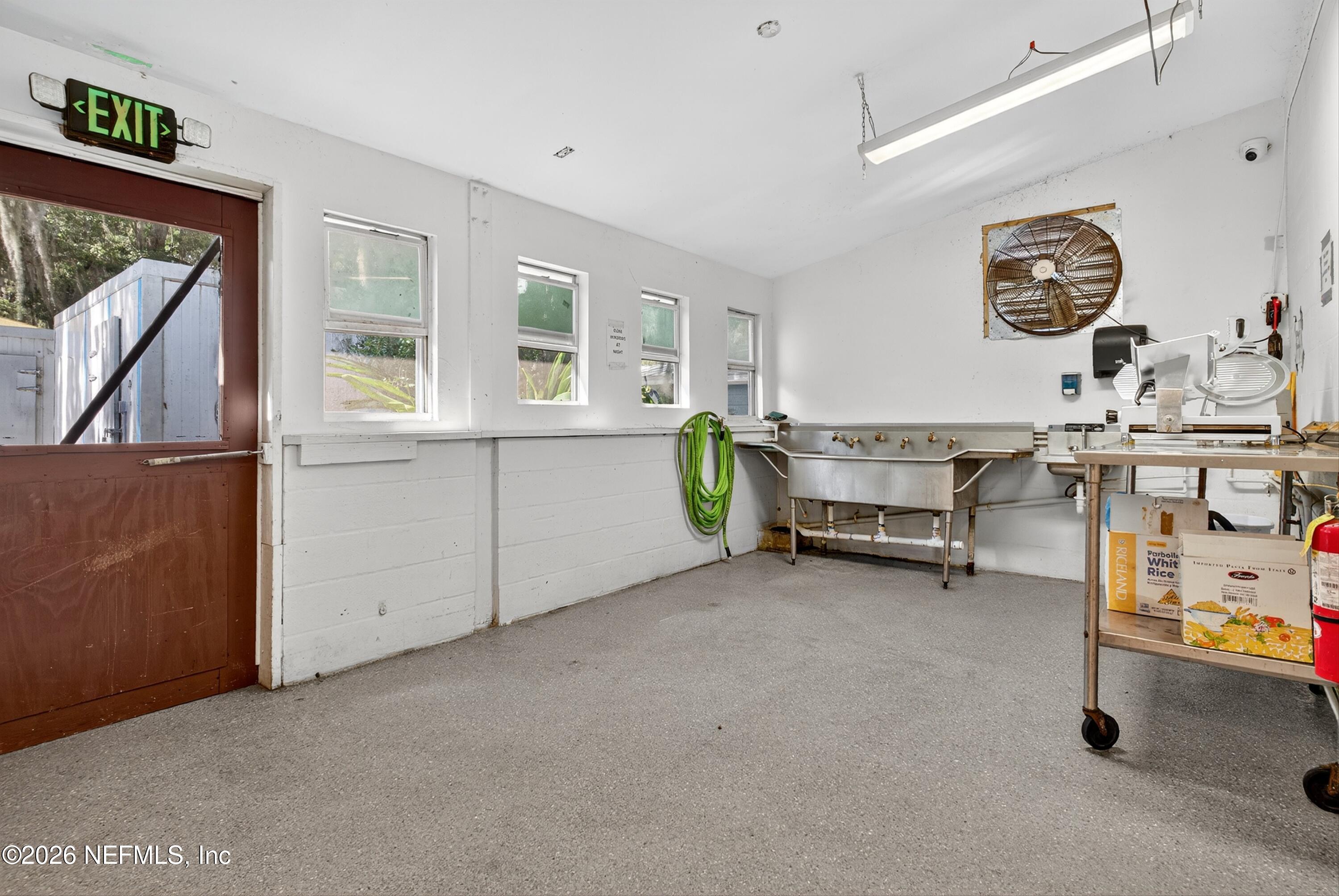 201 Oak Street Welaka, FL 32193 - Photo 88 of 115 a view of work space with furniture and windows