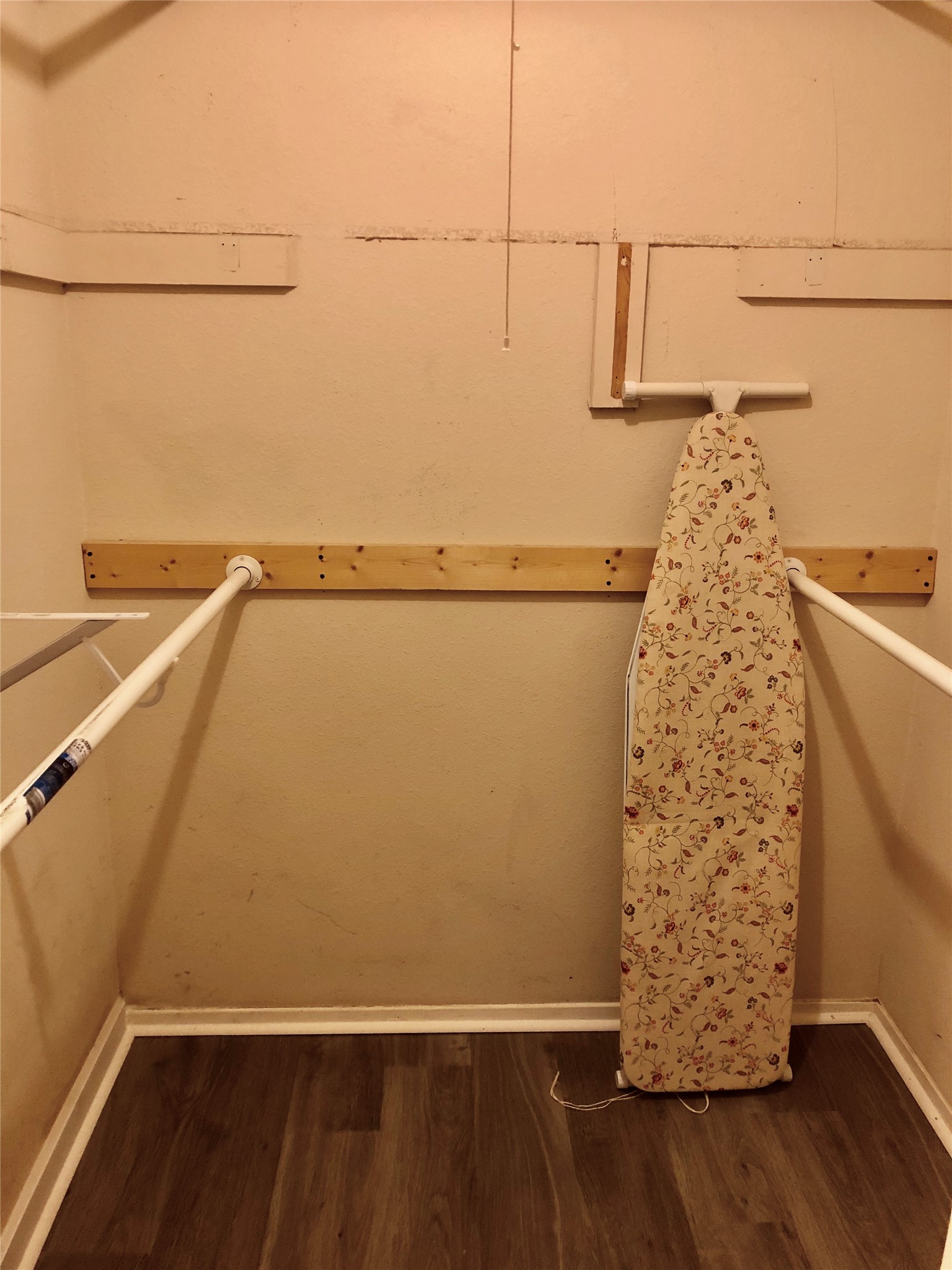 718 Decker Prairie Drive Austin, TX 78748 - Photo 17 of 22 Walk in closet featuring dark wood finished floors