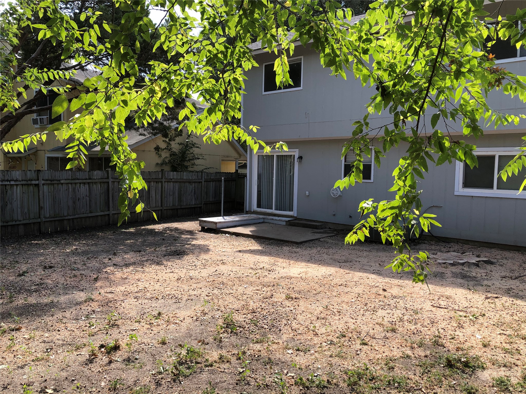 718 Decker Prairie Drive Austin, TX 78748 - Photo 4 of 22 Rear view of property with a patio