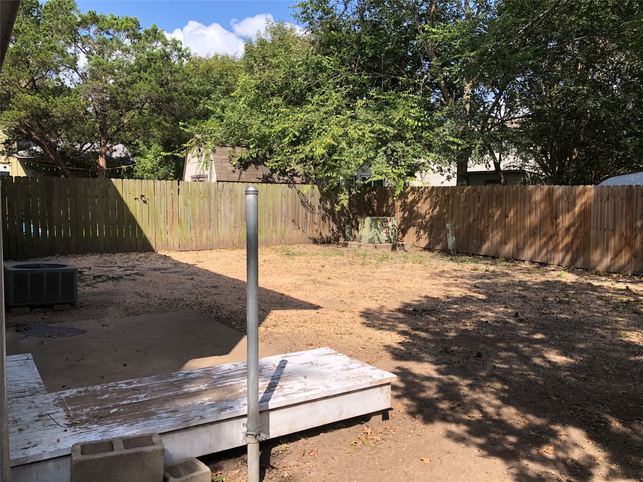 718 Decker Prairie Drive Austin, TX 78748 - Photo 5 of 22 Fenced backyard featuring a deck