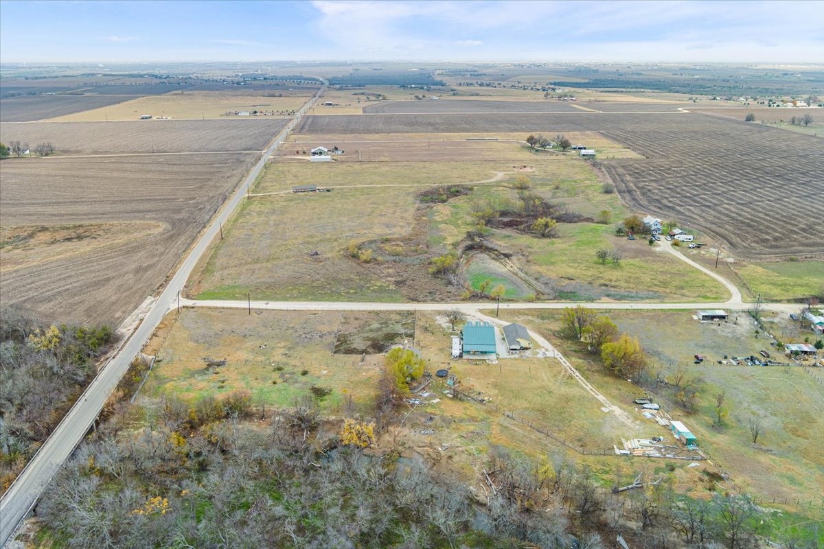 50 Dusty Dam Road Coupland, TX 78615 - Photo 31 of 38 The separation between the homes highlights privacy and functionality.