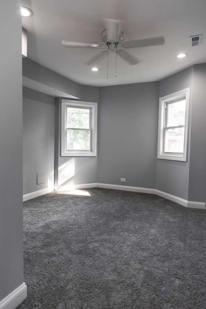 12124 South Stewart Avenue Chicago, IL 60628 - Photo 33 of 71 a view of an empty room with a window