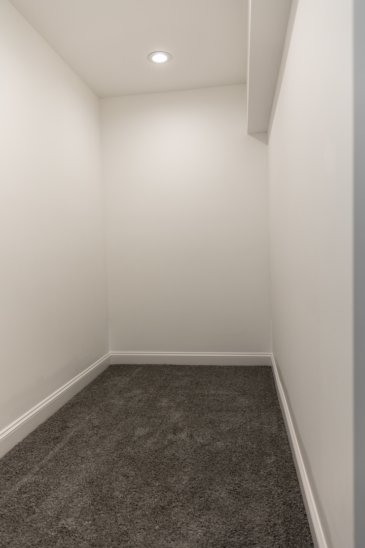 12124 South Stewart Avenue Chicago, IL 60628 - Photo 34 of 71 an empty room with a white wall and a window