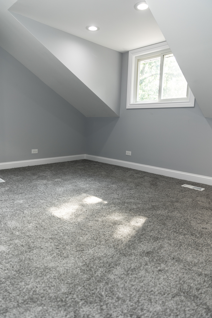 12124 South Stewart Avenue Chicago, IL 60628 - Photo 64 of 71 an empty room with a window