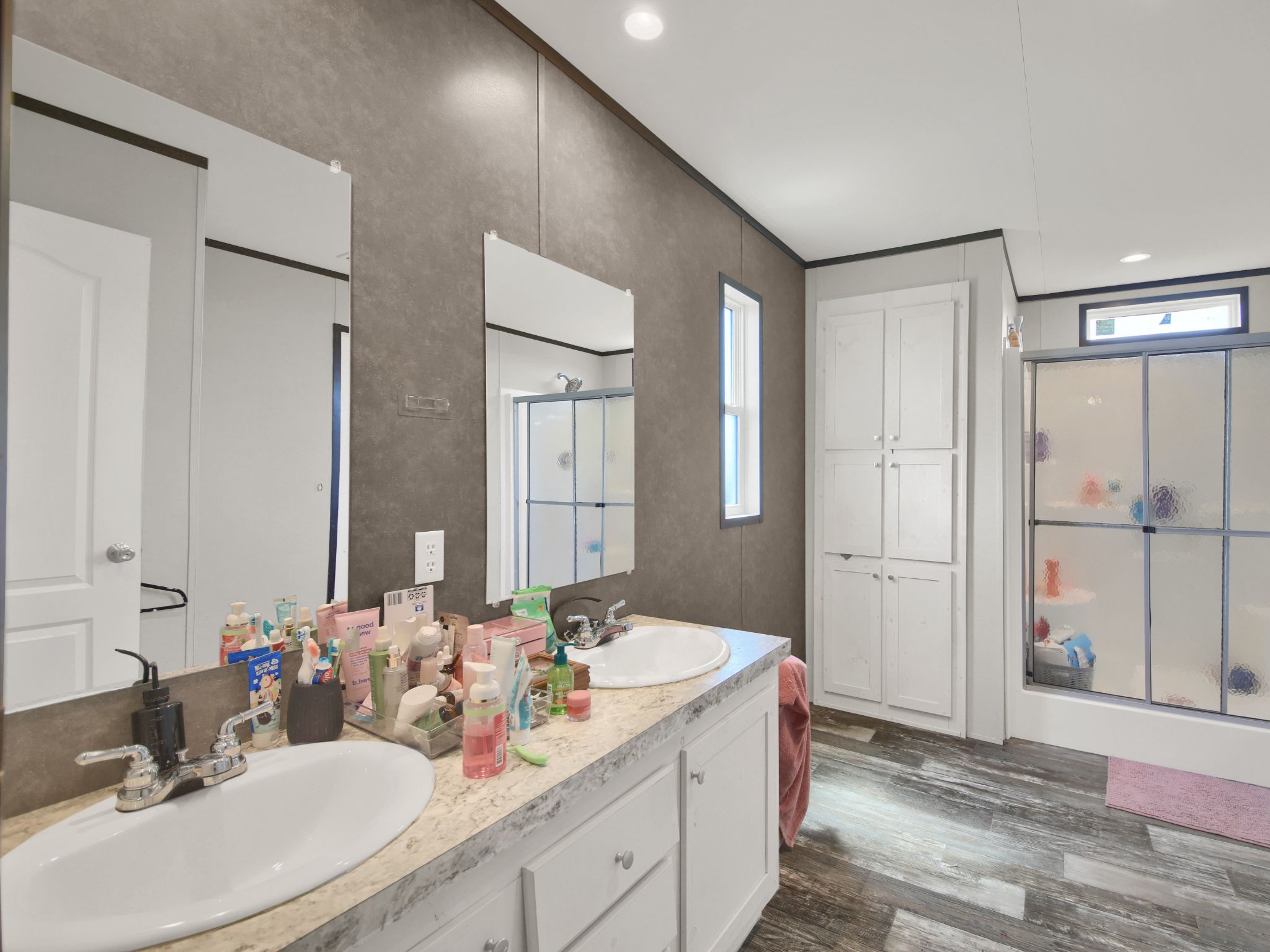 271 Alma Lane Kyle, TX 78640 - Photo 18 of 25 a bathroom with a double vanity sink mirror and double