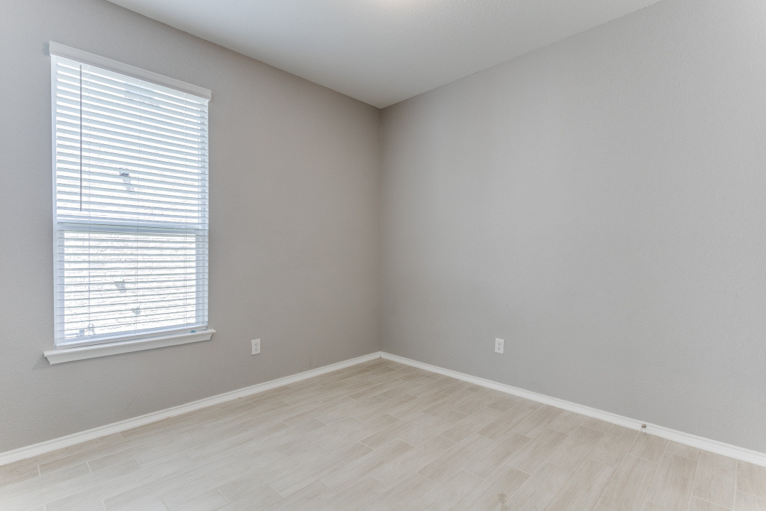 1100 Desaix Drive Georgetown, TX 78628 - Photo 19 of 25 an empty room with a window