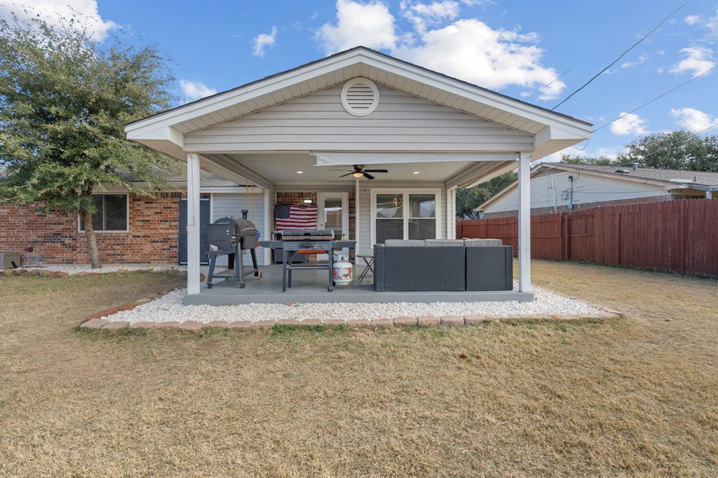 7629 Cedarhill Road Watauga, TX 76148 - Photo 29 of 33 Covered patio with recessed lighting and ceiling fan