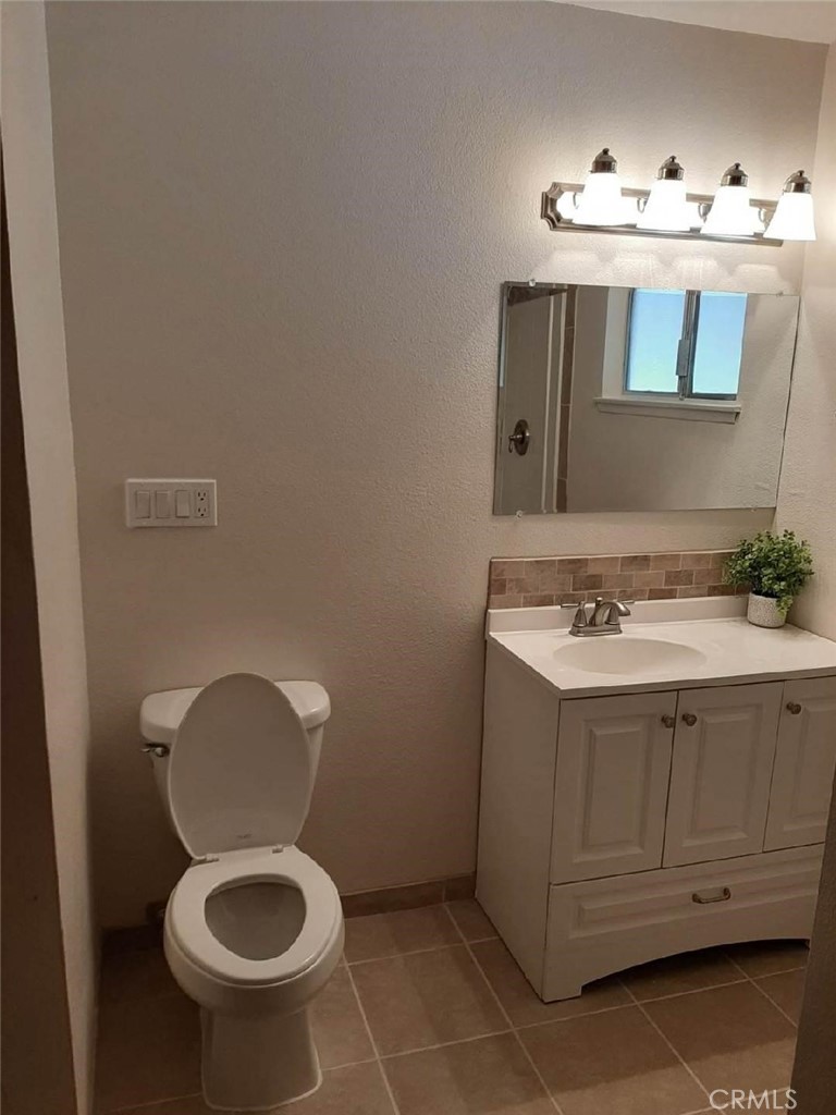 340 North 9th Street Blythe, CA 92225 - Photo 5 of 10 a bathroom with a sink and a toilet