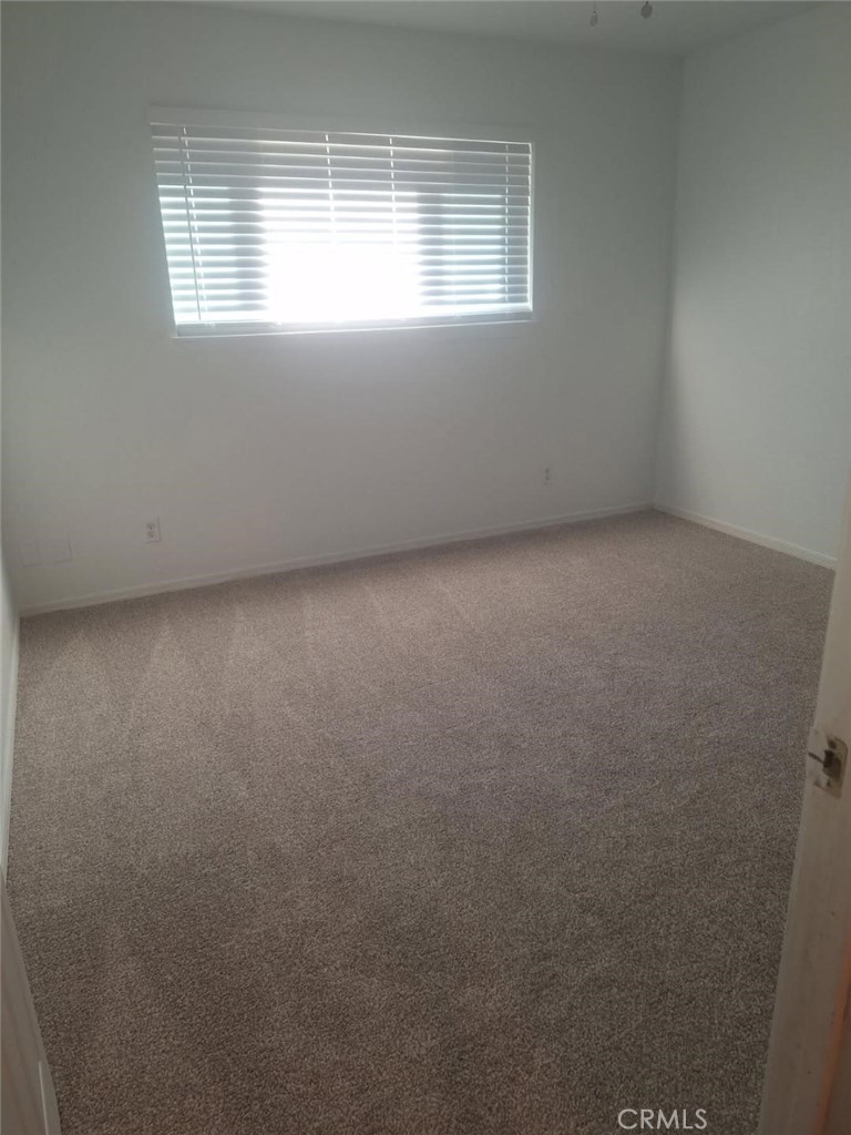 340 North 9th Street Blythe, CA 92225 - Photo 7 of 10 an empty room with a window