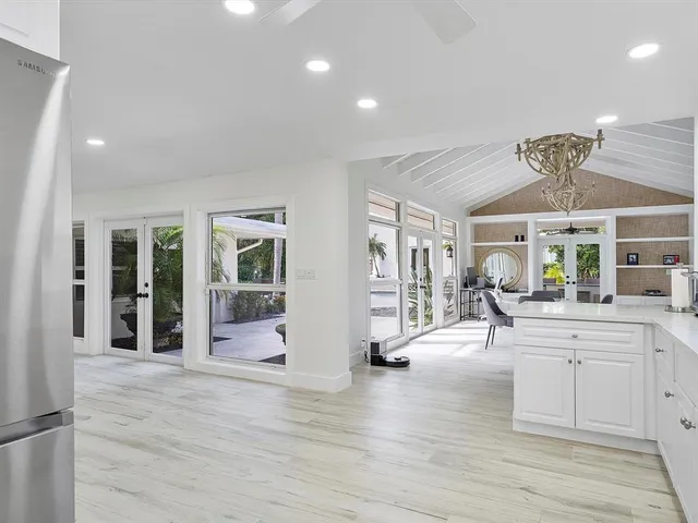 a view of a livingroom with furniture window and wooden floor