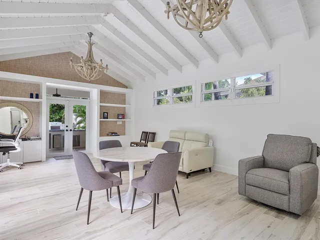 a view of a livingroom with furniture and wooden floor