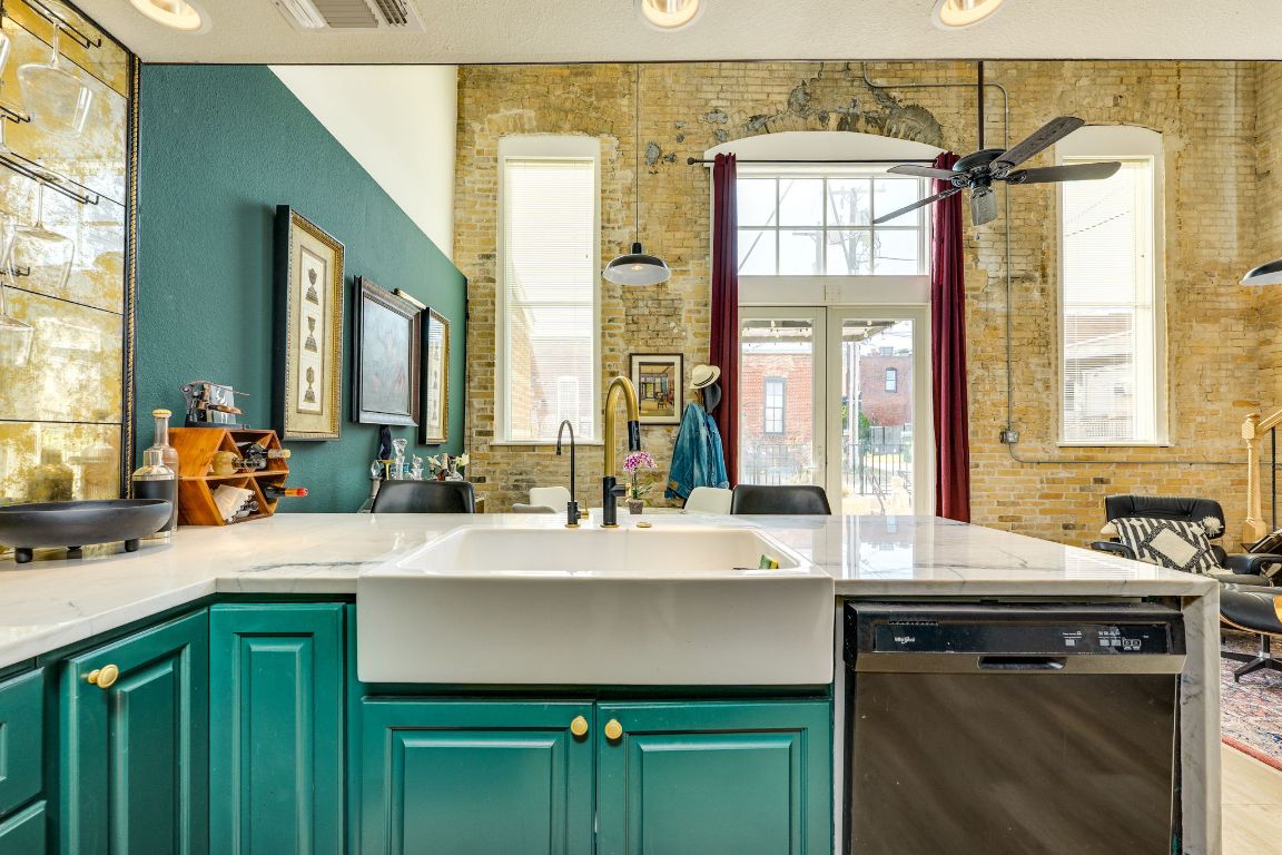 110 South Main Street, Unit 101 Elgin, TX 78621 - Photo 15 of 35 a bathroom with a sink and a mirror