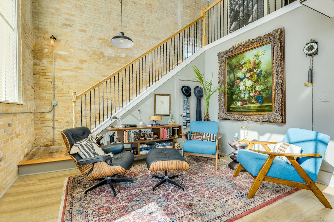 110 South Main Street, Unit 101 Elgin, TX 78621 - Photo 21 of 35 a living room with furniture and a window