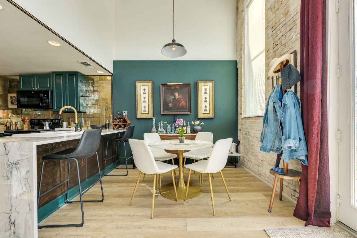 110 South Main Street, Unit 101 Elgin, TX 78621 - Photo 9 of 35 a view of a dining room with furniture
