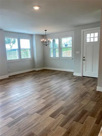 a view of a livingroom with a kitchen