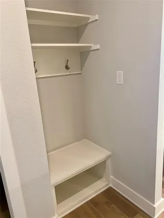 a view of small space with racks on the wall