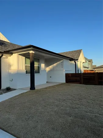 a house view with a backyard space