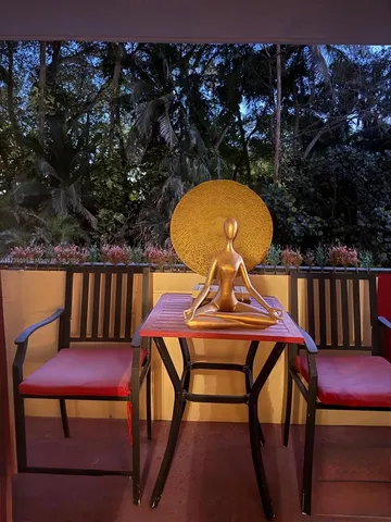 a view of a chairs and table in the outdoor space