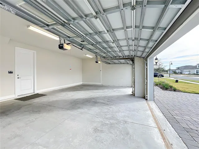 a view of kitchen with wooden floor