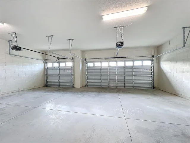 a view of hallway with wooden floor