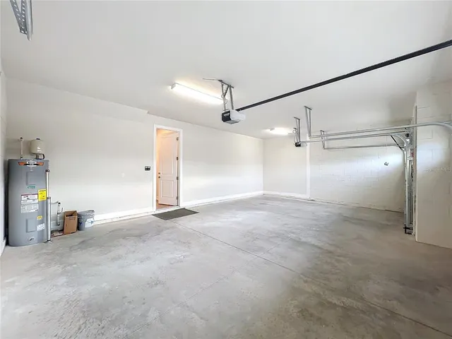 a kitchen with refrigerator and oven