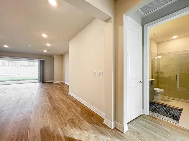 a view of a room with racks on the wall