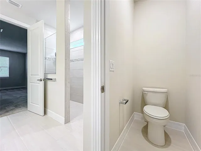 an aerial view of a city with ocean view