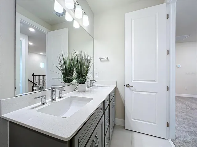 a view of swimming pool with outdoor seating and lake view